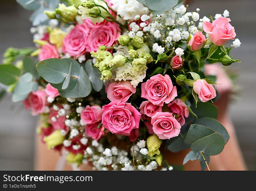 Bride With A Bouquet Of Pink Roses