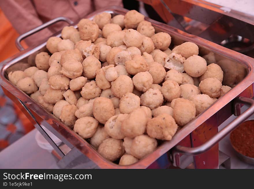 Indian famous street snack dahivada or dahi bhalla served during Indian wedding