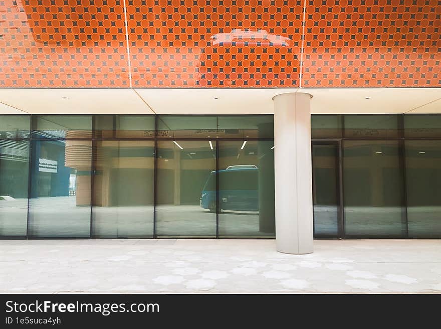 UAE, Abu Dhabi - 13th march, 2023: Autonomous car stand in futuristic city Masdar by Eco-friendly architecture. Masdar future City