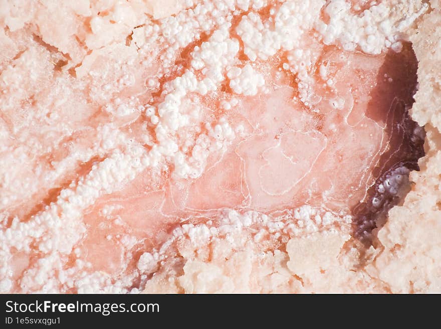 Close up macro top view salt mineral particles macro on Maharlu salt lake in Turkey . Tuz golu panorama with horizon in sunny summ