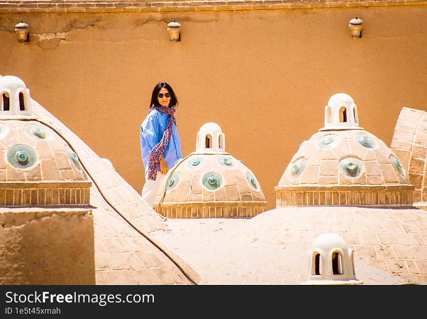 Kashan, Iran - 29th june, 2022: Muslim tourist visit Sultan Amir Ahmad Bathhouse. Caucasian tourist visit famous bathhouse in Kashan with tout Guide explain