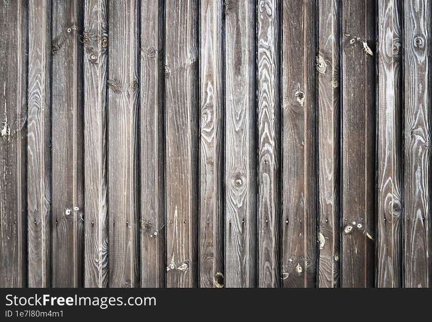 Vertical old wooden planks background.