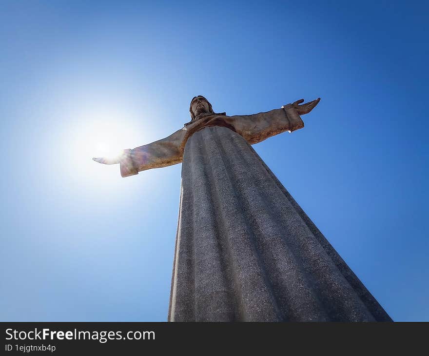 The Sun in the hand of Jesus, statue Lissbon, Portugal