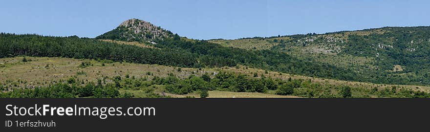 Panoramic view of the mountains and forests in the summer