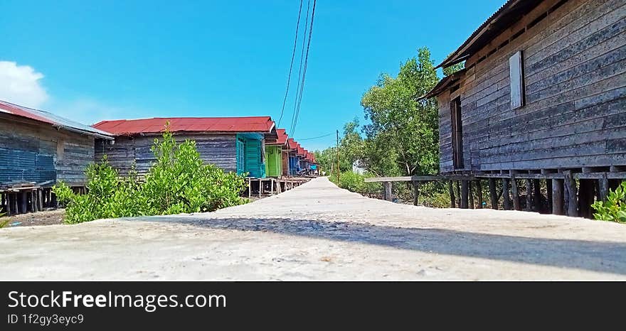 A Village With Small Alleyways On Land With Simple Houses