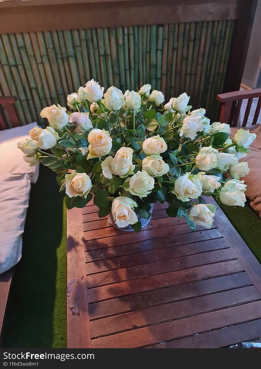 bouquet of white roses on the table