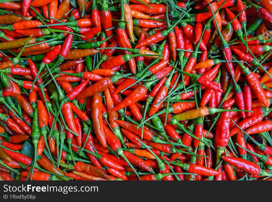 Red chili peppers on flat surface