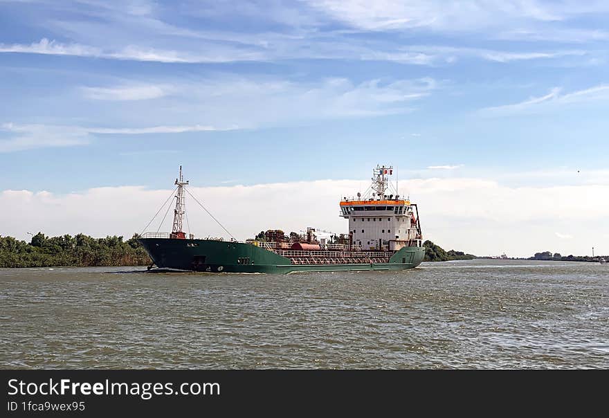 Cargo ship transiting danube waterway through Sulina