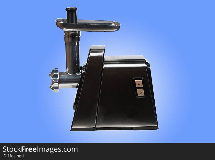 Mincing machine on blue background