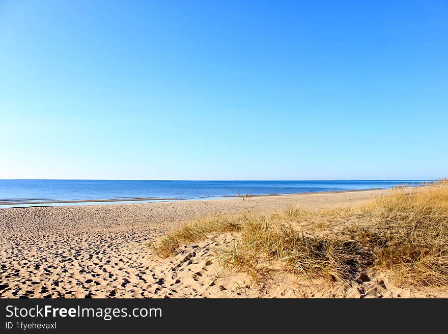 Dunes of leba with rain clouds over the baltic sea, unesco world biosphere reserve, slowinski national park, polish baltic sea coa