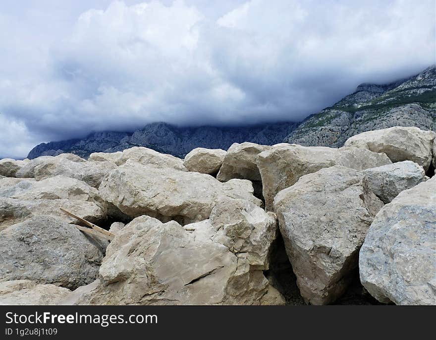 Mountain with clouds and rocks