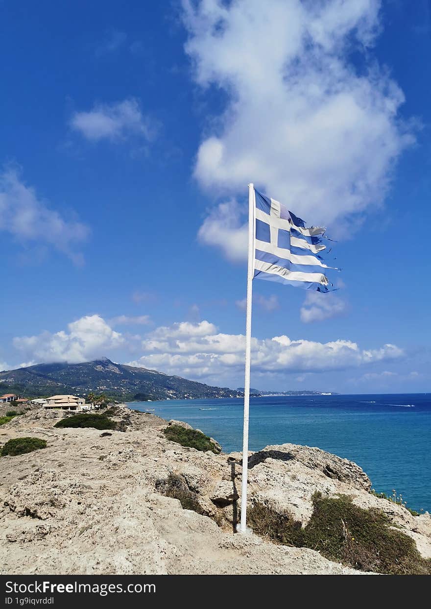 Greece Flag at the northern point of Island Zakynthos, Greece