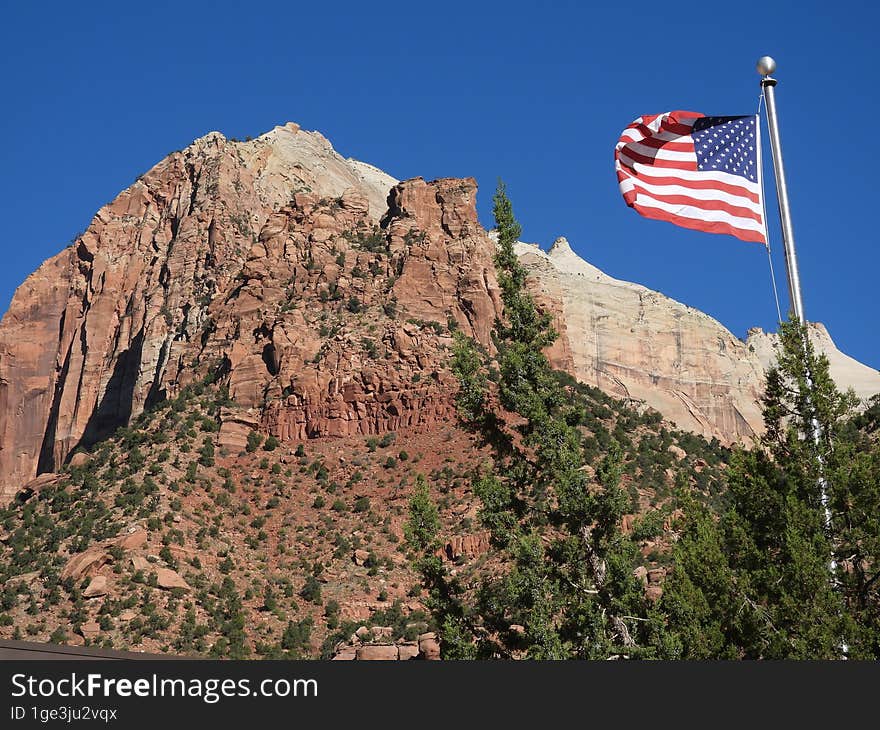 Bryce Canyon City with the flag of the United States