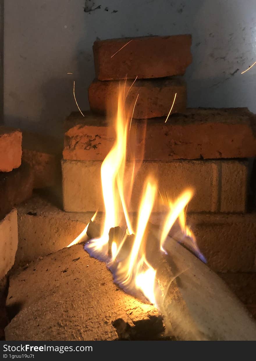 embers in front of the house to warm yourself on cold evenings. embers in front of the house to warm yourself on cold evenings