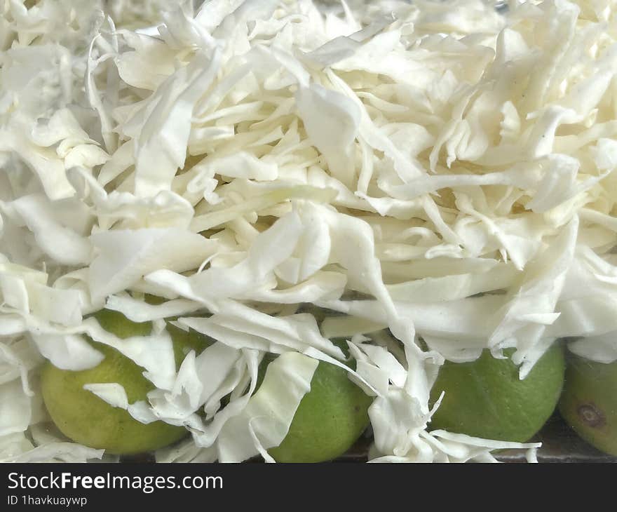 Slices of white cauliflower as a design background