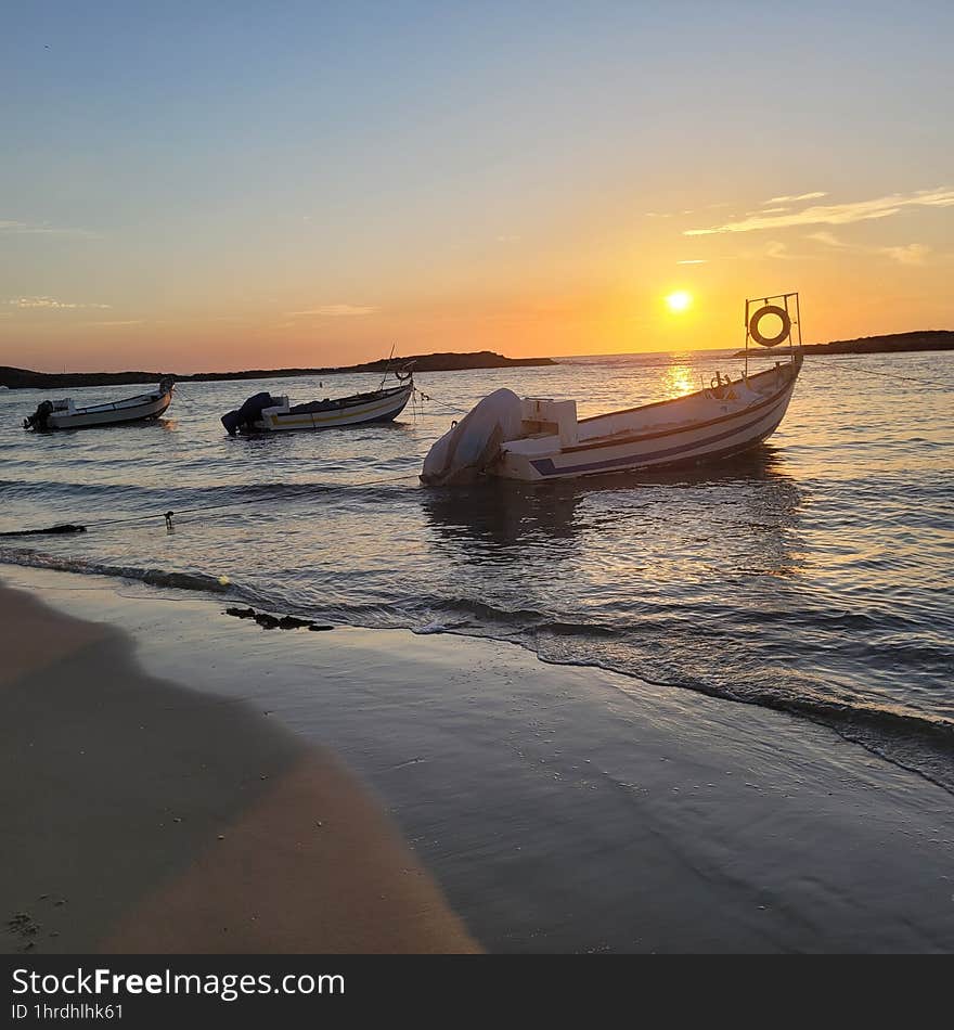 Fishing Boats On The Background Of The Sunset