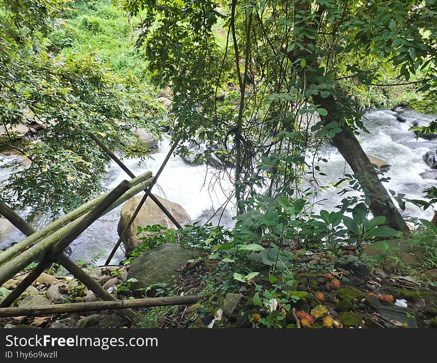 A Fast Flowing River On A Mountain Slope