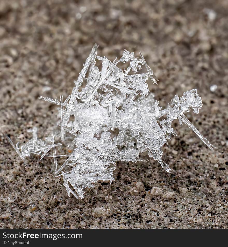 Macro photo of some snow crystals. Colibita, Bistrita-Nasaud, Romania. I used AI to remove noise.