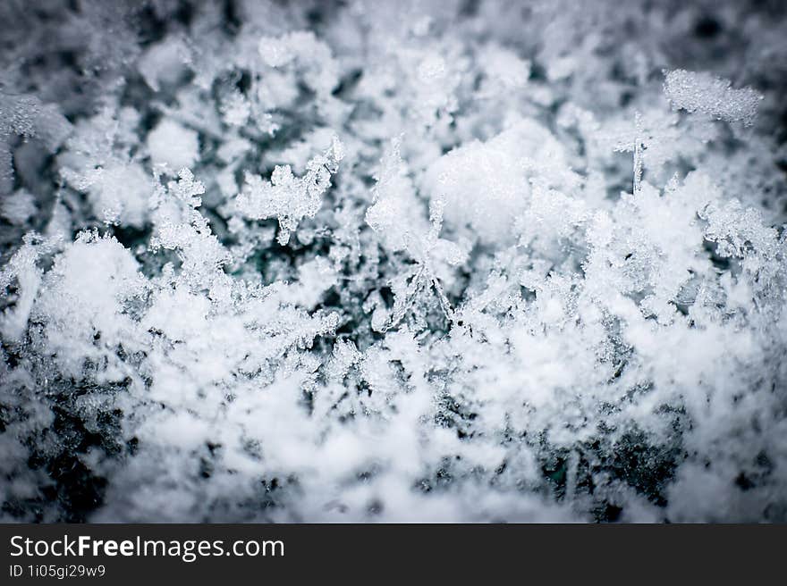 Macro photo of some snow crystals. Colibita, Bistrita-Nasaud, Romania. I used AI to remove noise.