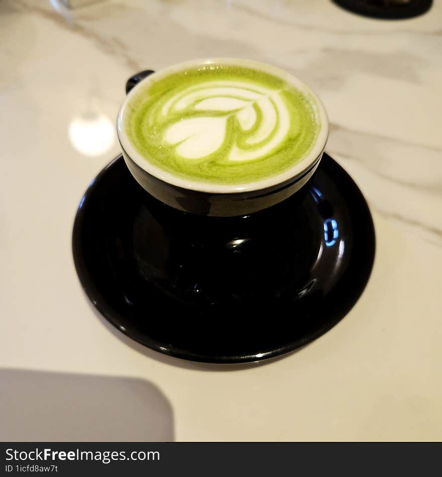 a cup of green tea matcha latte