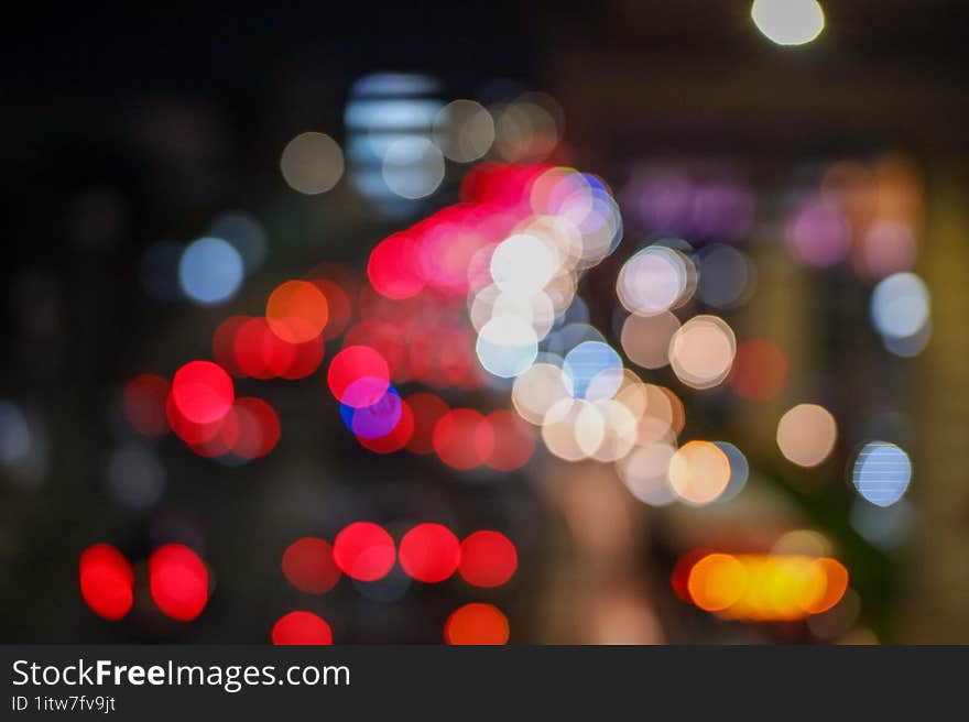 Blur and abstract background from above the pedestrian bridge with bokeh and vehicle lights