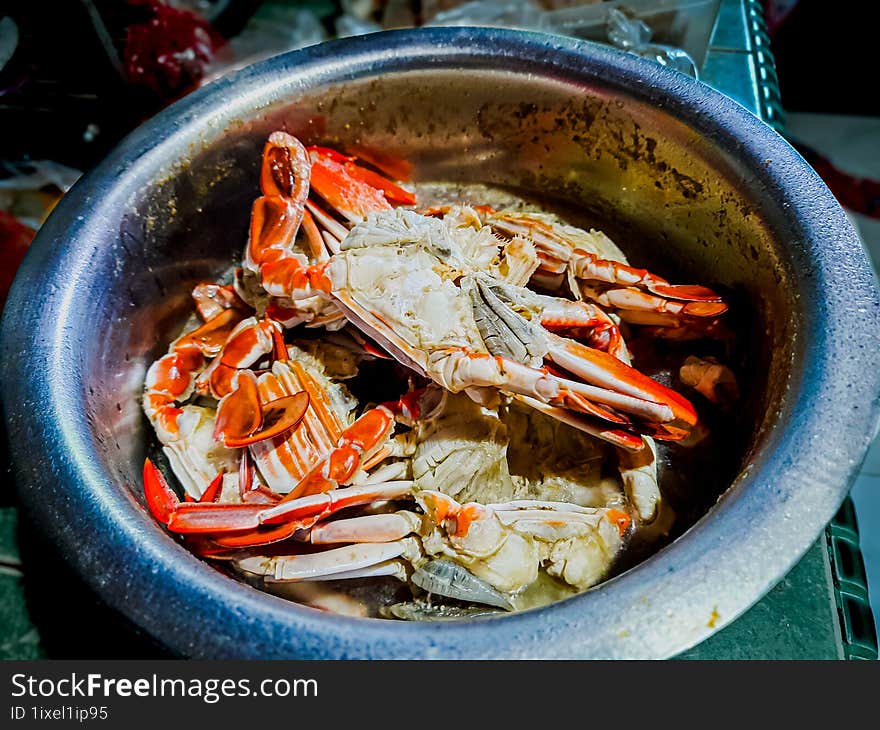 crab that has been boiled with spices and added to the pan