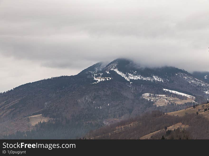 Mountain landscape with Tonca peak from Colibita, Bistrita-Nasaud. This mountain peak have 1583 meters altitude. Mountain landscape with Tonca peak from Colibita, Bistrita-Nasaud. This mountain peak have 1583 meters altitude.