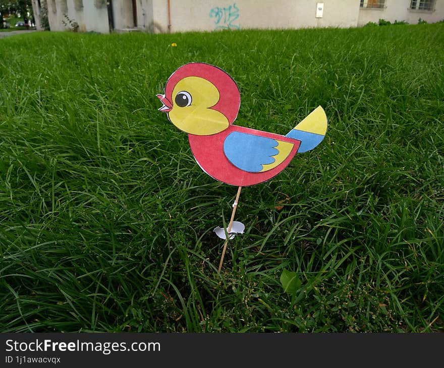 Cardboard bird in the park