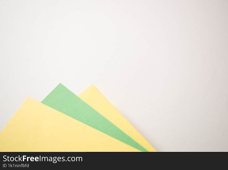 Green, yellow and white geometric abstract background with copy empty space