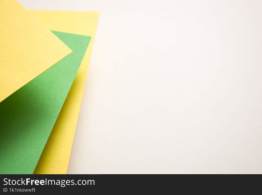 Green, yellow and white geometric background, copy space