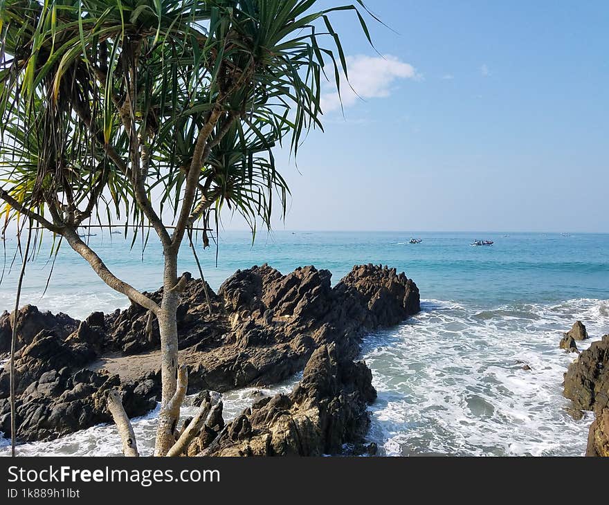 The atmosphere on the beach with beautiful waves and coral