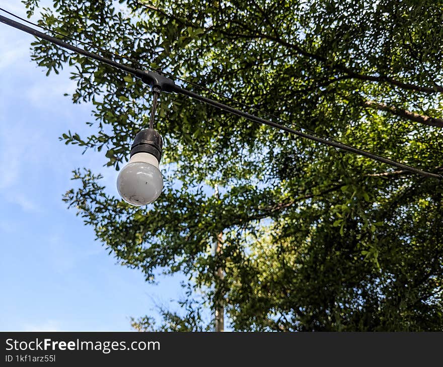 White hanging lamp in the garden