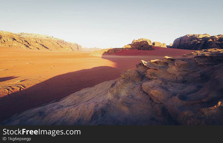 Planet Mars like landscape - Photo of Wadi Rum desert in Jordan with red pink sky above, this location was used as set for many science fiction movies