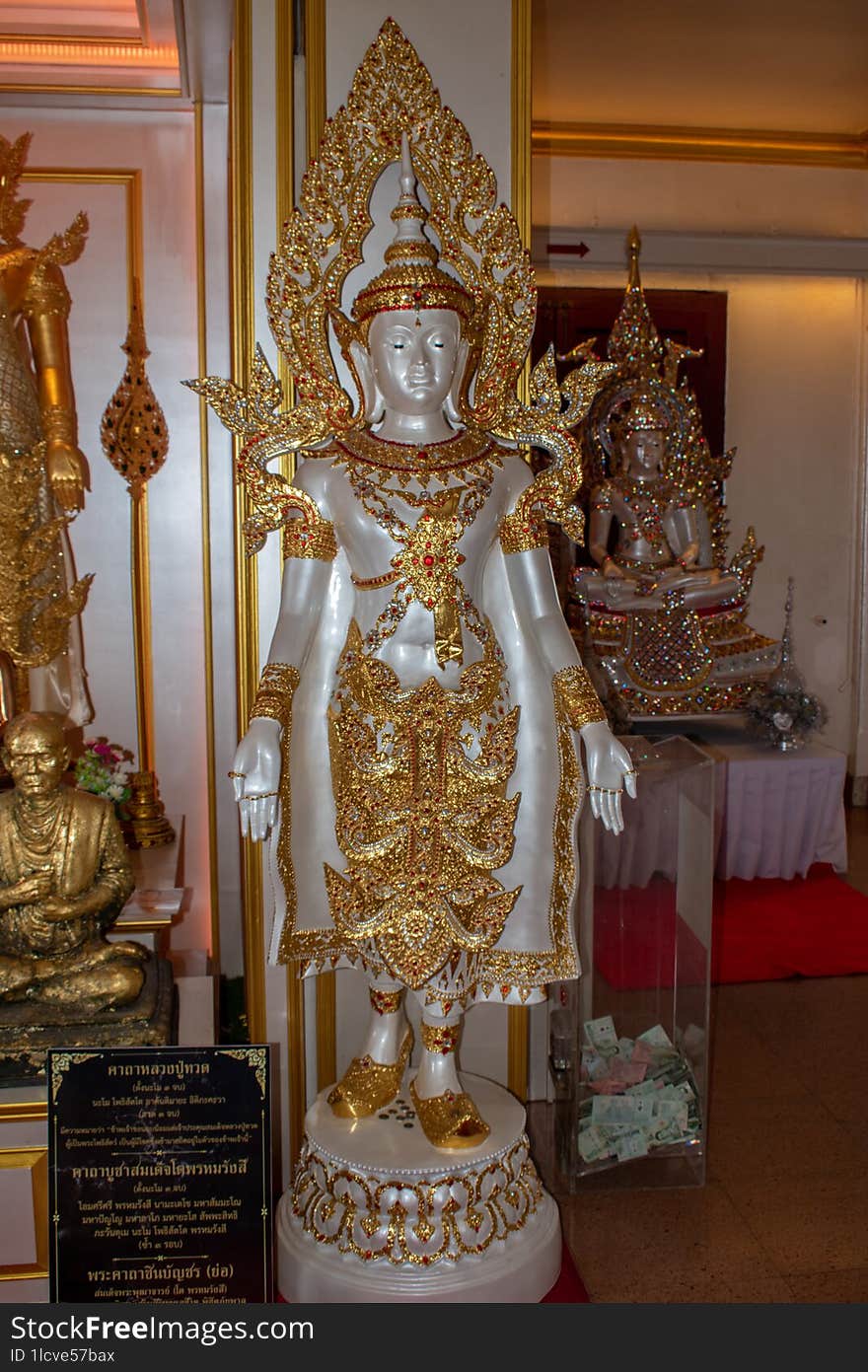 Statue at Wat Saket & x28 The Golden Mount& x29   impressive temple, in a beautiful environment with nature around.you have to wal