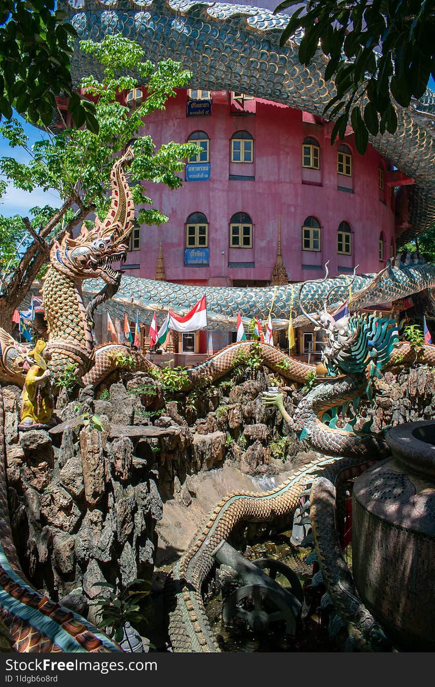 Dragon temple or Wat Samphran  This amazing and so uniq pink temple with dragon around its one of my favorite.  The temple is a blend of Chinese beliefs and Thai culture and beliefs brought in by the local monks.