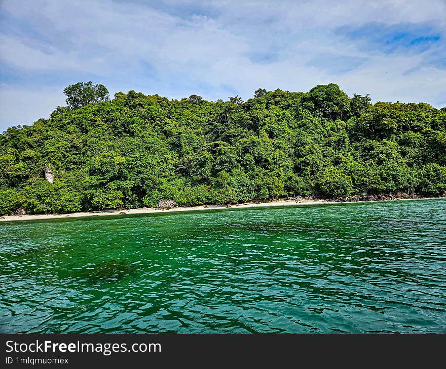 A Beautiful Island In The Form Of A Forest Located In The Bay Of Lampung, Indonesia.