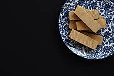 Cookies On Plate With Black Background Royalty Free Stock Photo