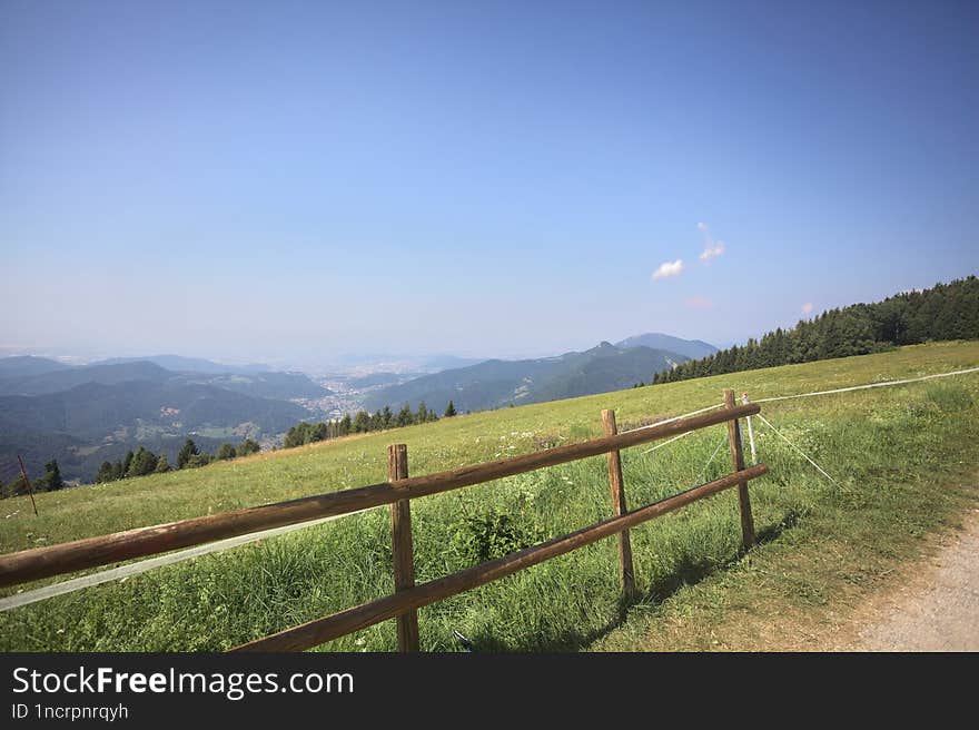 Concrete path on a sunny day in the mountain in summer. Concrete path on a sunny day in the mountain in summer