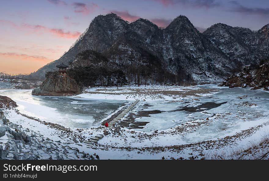 Snow capped mountains and frozen rivers on a clear day  in winter in sunset, South Korea