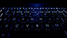 The Keys On A Modern Laptop Keyboard Have A Background Backlight Stock Images