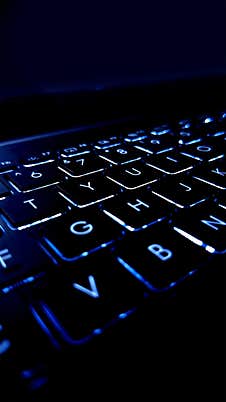 The Keys On A Modern Laptop Keyboard Have A Background Backlight Royalty Free Stock Image