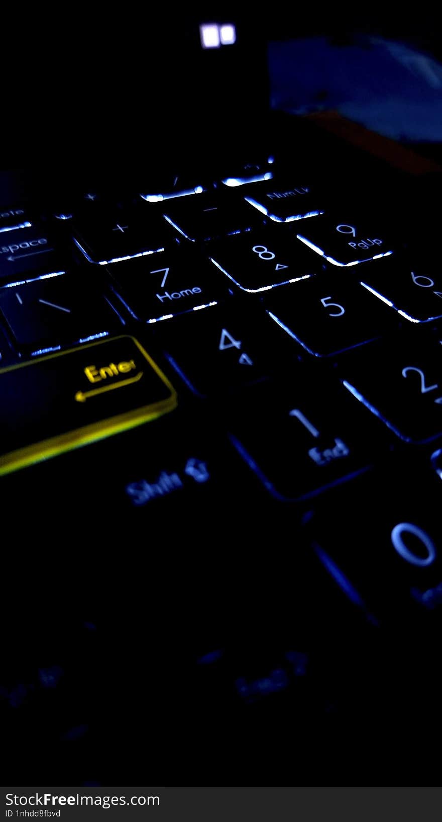 The keys on a modern laptop keyboard have a background backlight