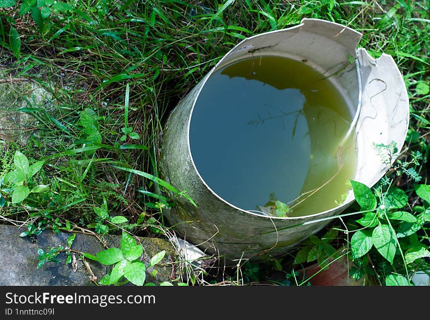 Puddle Of Dirty Water In The Bucket