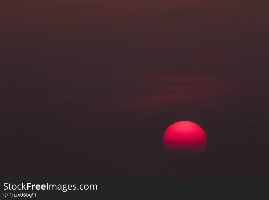 beautiful and simple sunset and dark red sky.