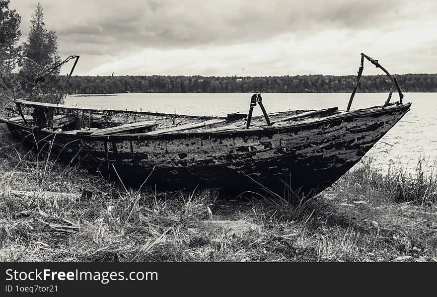 Old Abandoned Fishing Boat On The Shore