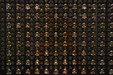 Grid Of Spherical Objects That Magnify The Black Background Behind Them, Creating A Repetitive Pattern Effect Royalty Free Stock Photos