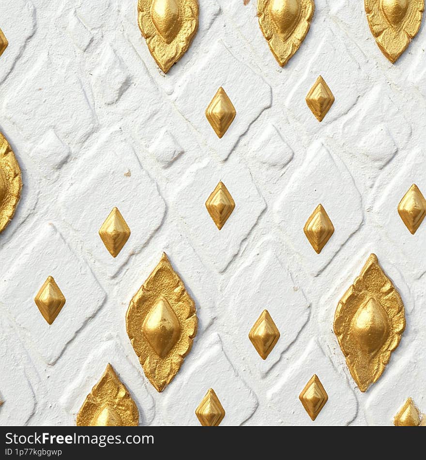 Traditional Thai gold leaf patterns that are seamlessly strung together