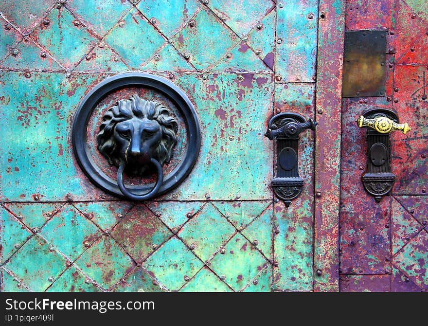 Old doors with a rusty hooks