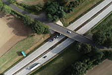 Two Lane Highway With Cars Visible, Top Down Aerial View Stock Photos