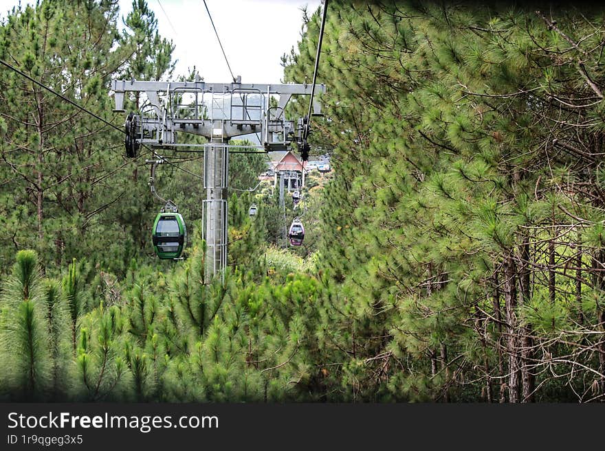 Cable-car road through the forest. View from the cabin